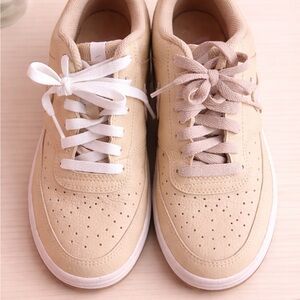Nike Beige Low-Top Sneakers - Neutral Casual Style